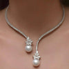 Elegant shiny necklace with pearls made of sterling silver